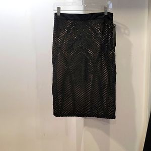 Black satin and lace skirt